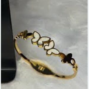 Elegant Gold and White Butterfly Bracelet